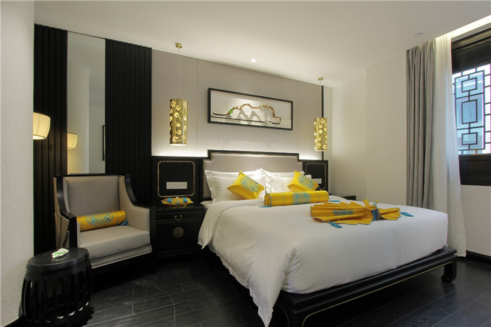 勃朗中式酒店裝修公司推薦望月中式酒店客房設計方案