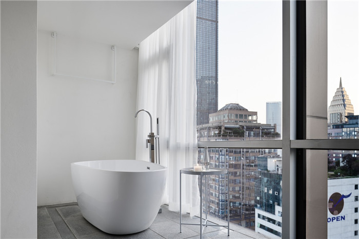 鄭州勃朗設計分享簡約樸質的白居精品酒店客房浴缸設計方案