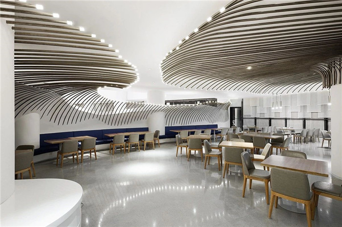 以海浪為靈感的純白前衛風度假酒店餐廳設計案例賞析