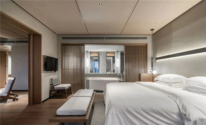 酒店大床房設計-云南3000平度假酒店翻新改造設計案例  邂逅簡約之美